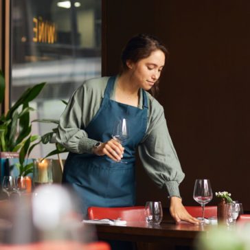 female-waitress-setting-tables-2023-11-27-05-13-23-utc-1.jpg